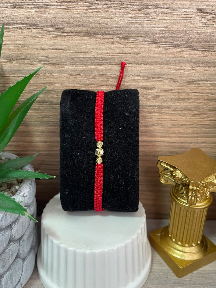 PULSERA TEJIDA ROJA 3 BAILES ORO LAMINADO