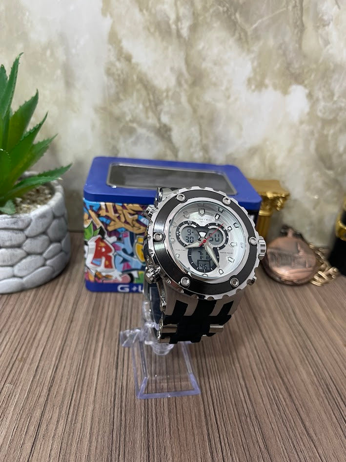 RELOJ LIMITED G PLATEADO MANILLA NEGRA DE SILICONA