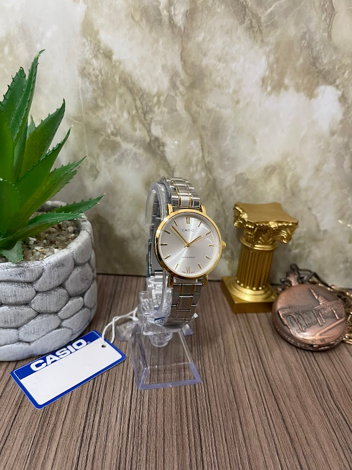 CASIO BICOLOR DAMA NUMEROS DORADOS