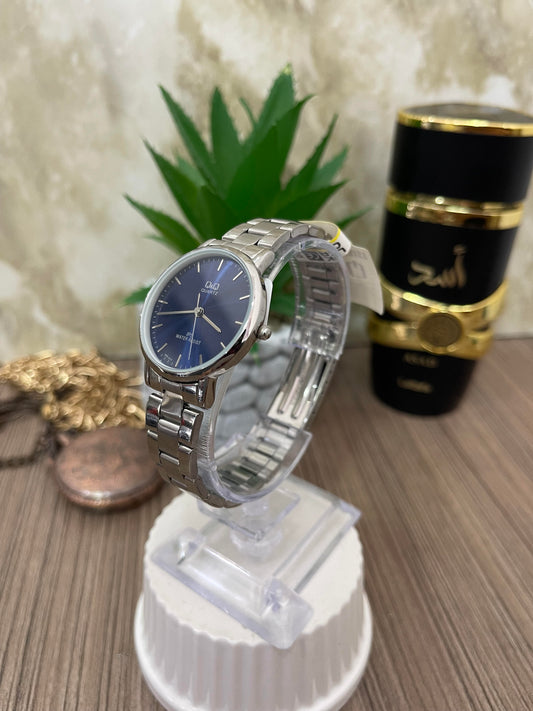 QYQ DAMA PLATEADO FONDO AZUL NUMEROS EN LINEA