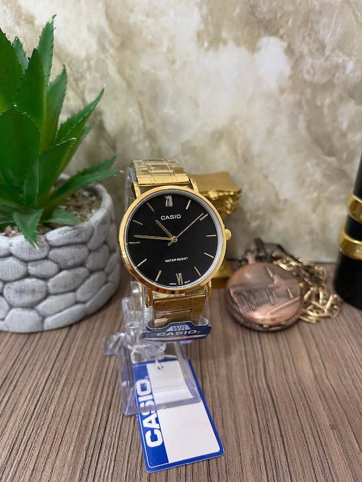 CASIO CABALLERO DORADO FONDO NEGRO