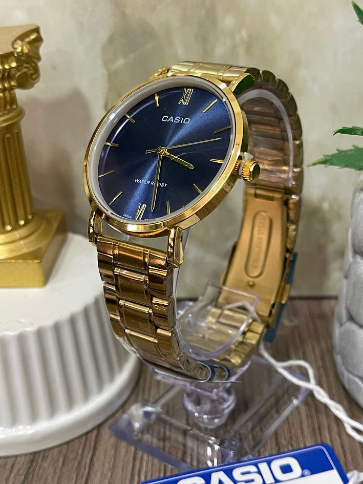 RELOJ CASIO CABALLERO DORADO FONDO AZUL
