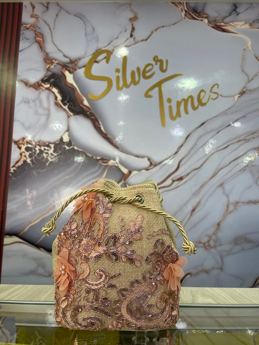 BOLSO TIPO MOCHILA DETALLES ROSADOS
