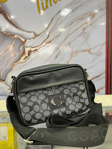BOLSO DE MANO CABALLERO COACH