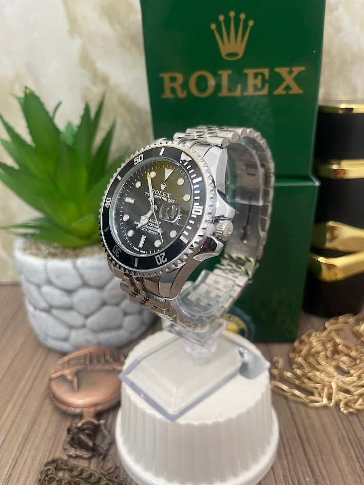 ROLEX CABALLERO PLATEADO ESFERA NEGRA MANILLA TRENZADA
