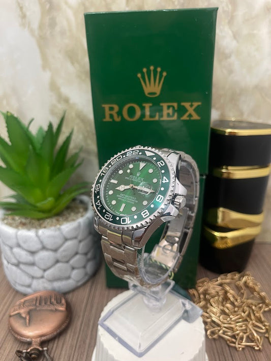 RELOJ ROLEX CABALLERO PLATEADO ESFERA Y ARO VERDE