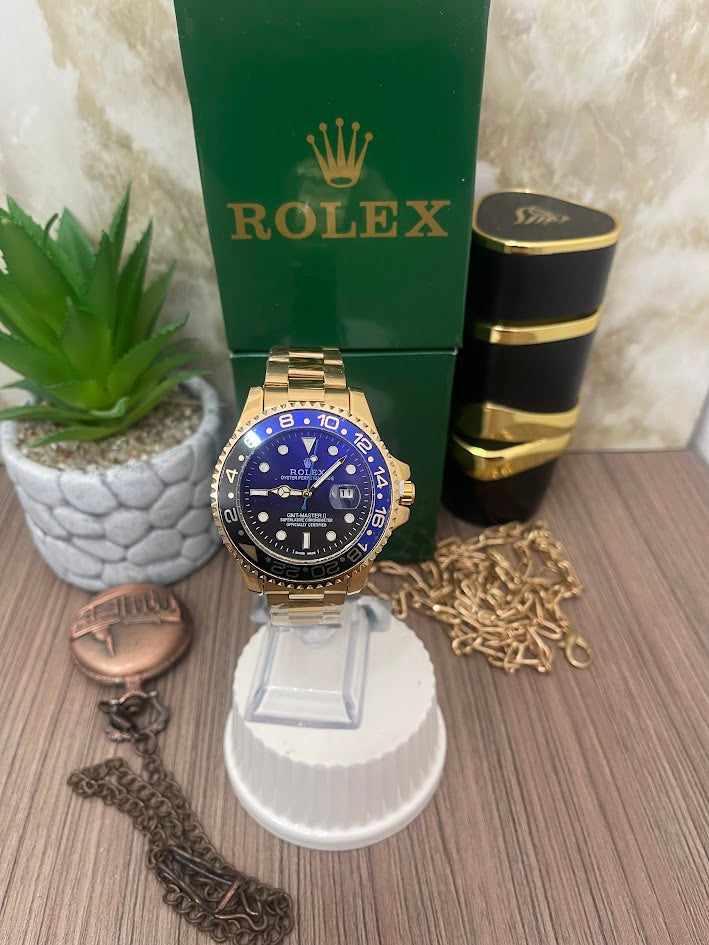 ROLEX CABALLERO DORADO ESFERA AZUL Y NEGRA ARO AZUL Y NEGRO