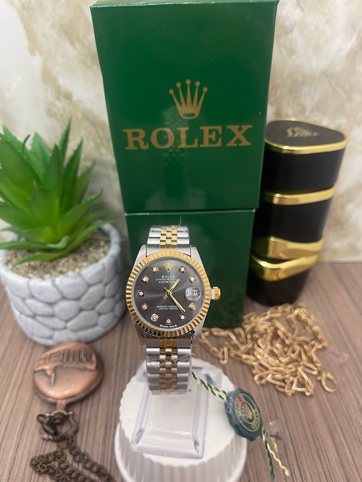 ROLEX DAMA BICOLOR ESFERA NEGRA MANILLA TRENZADA ARO DORADO