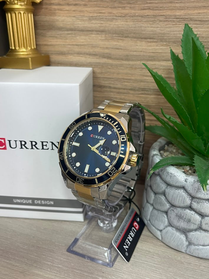 RELOJ CURREN BICOLOR ARO AZUL FONDO AZUL CON CALENDARIO
