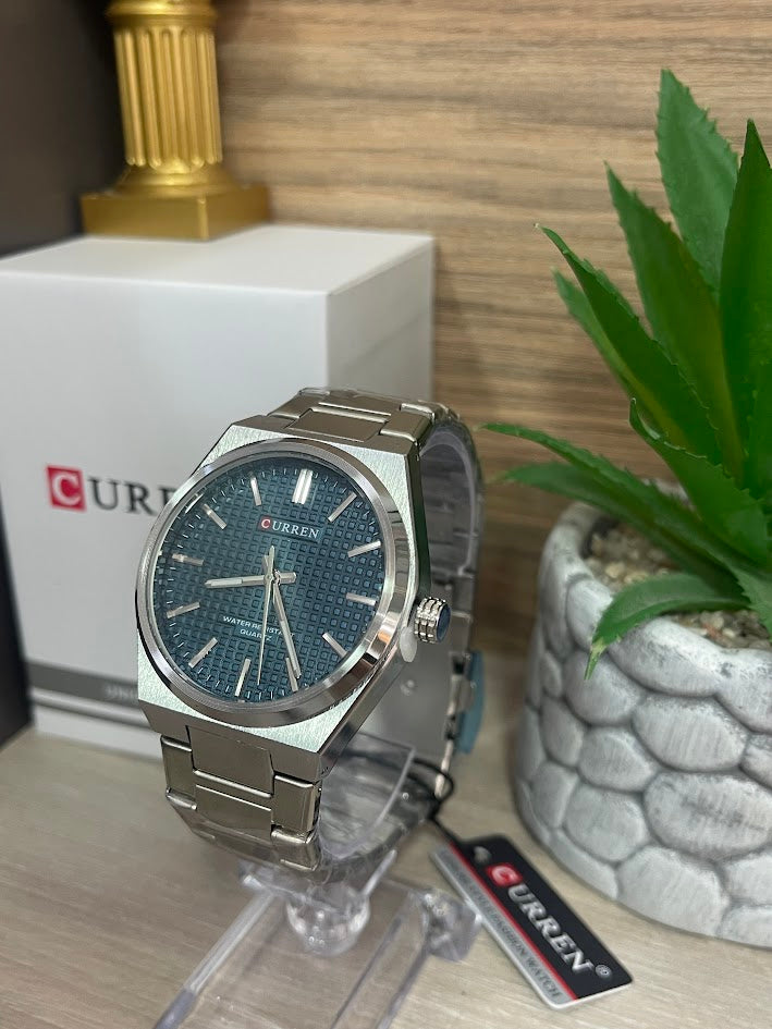 RELOJ CURREN PLATEADO FONDO AZUL MARINO