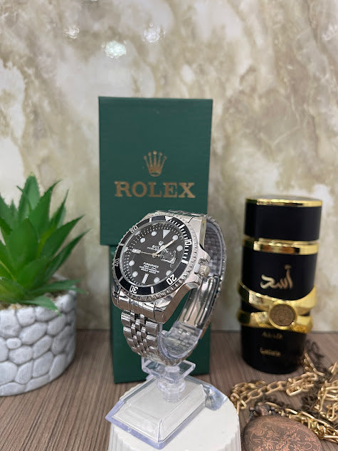 ROLEX PLATEADO ESFERA NEGRA ARO NEGRO INCLUYE CAJA