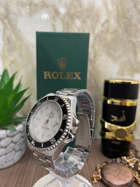 ROLEX PLATEADO ESFERA BLANCA ARO NEGRO INCLUYE CAJA