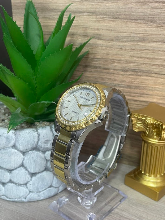 RELOJ TECHNOMARINE DAMA BICOLOR DETALLES EN PIEDRA FONDO PLATEADO