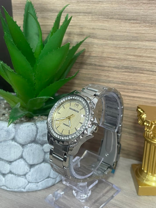 RELOJ TECHNOMARINE DAMA PLATEADO DETALLES EN PIEDRA FONDO DORADO