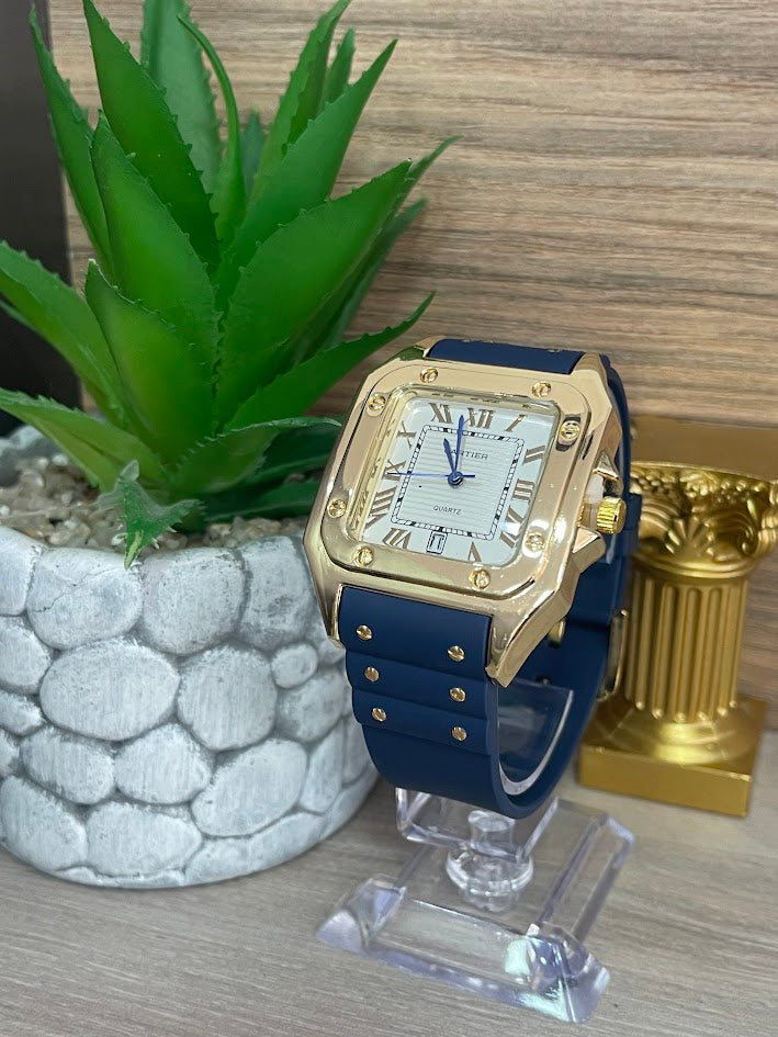 RELOJ CARTIER CABALLERO DORADO MANILLA DE SILICONA AZUL FONDO PLATEADO CON CALENDARIO