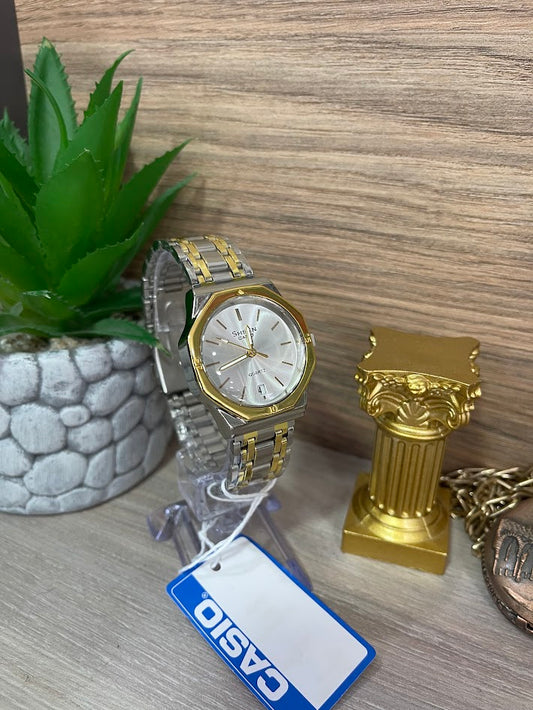 RELOJ CASIO SHEEN DAMA BICOLOR FONDO PLATEADO CON CALENDARIO