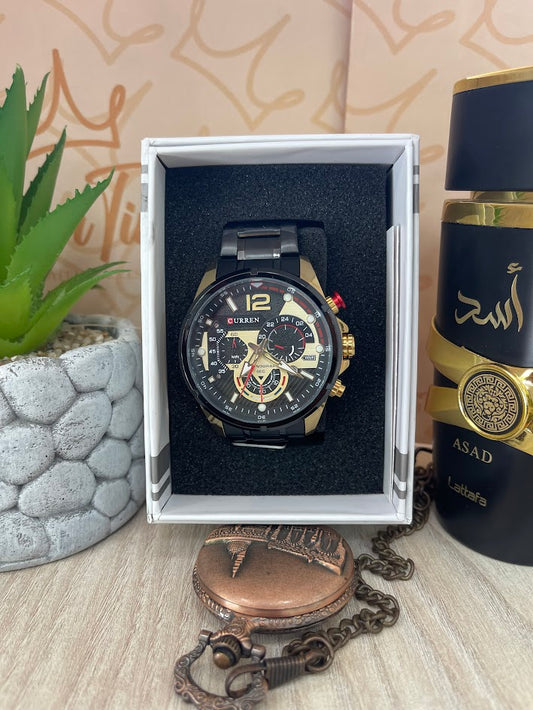 RELOJ CABALLERO CURREN NEGRO CAJA DORADA DELLALLES ROJOS