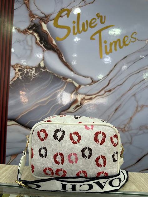 BOLSO DE MANO COACH BLANCO BESOS
