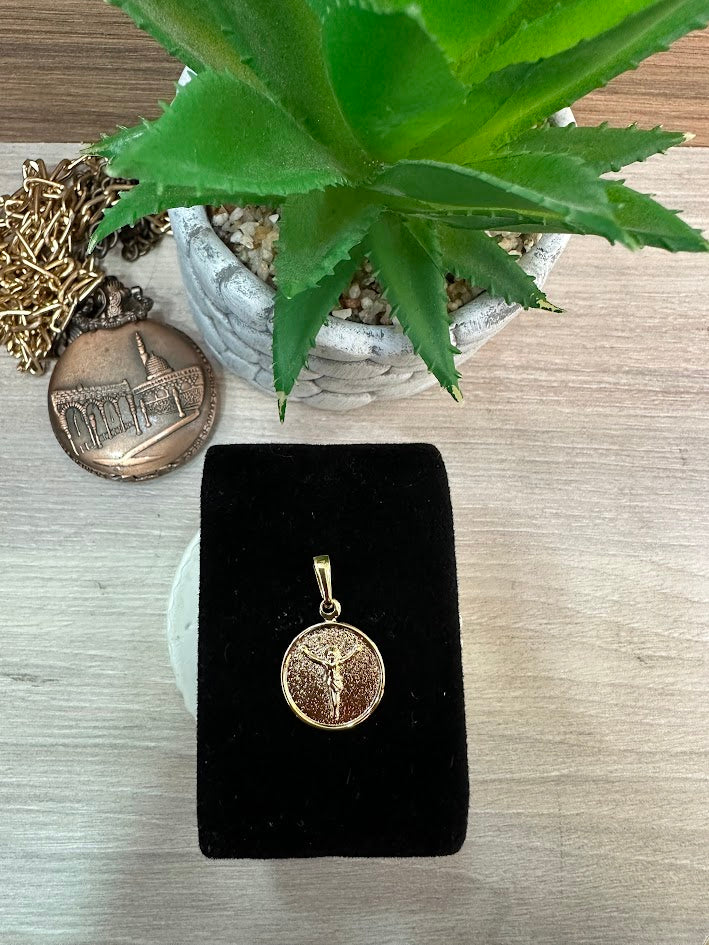 DIJE REDONDO JESUCRISTO ORO LAMINADO