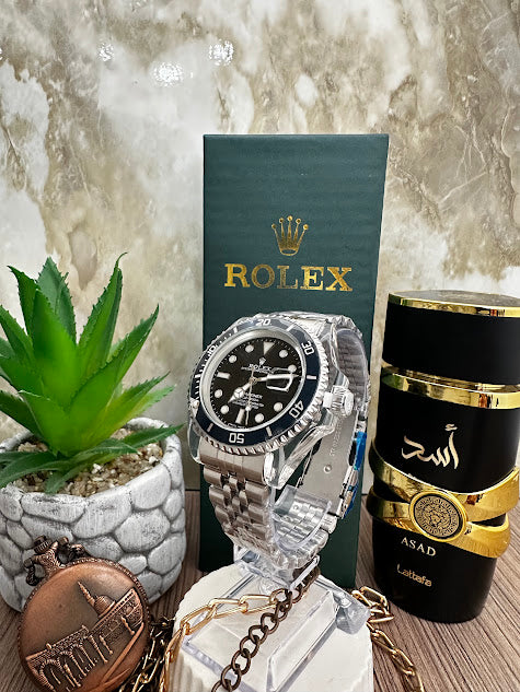 RELOJ ROLEX MANILLA PLATEADA ESFERA NEGRA ARO AZUL