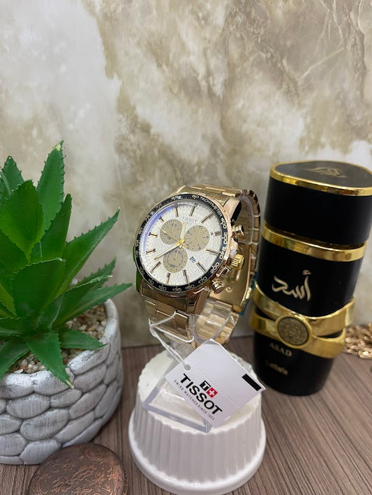 RELOJ TISSOT DORADO