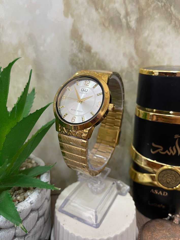 RELOJ QYQ CABALLERO DORADO ESFERA PLATEADA