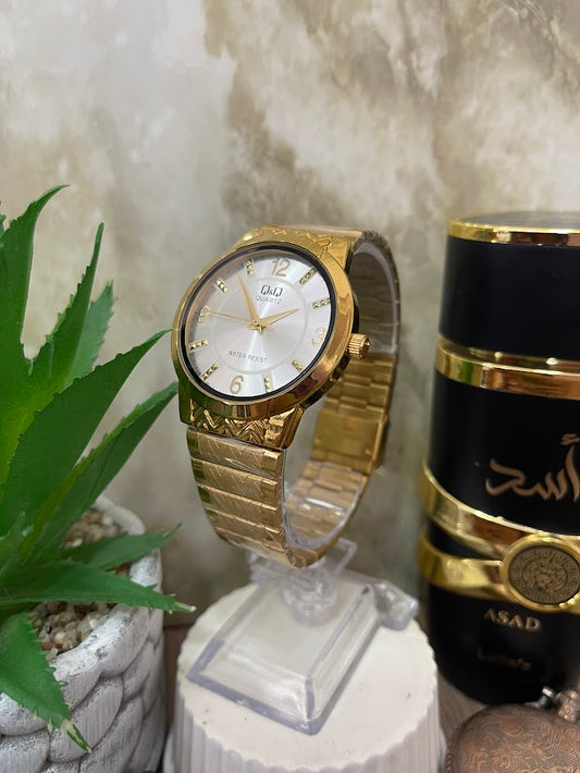 RELOJ QYQ CABALLERO DORADO ESFERA PLATEADA