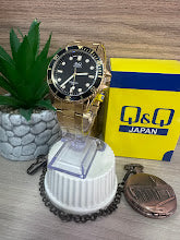 RELOJ Q&Q DORADO ESFERA NEGRA ARO NEGRO TIPO ROLEX