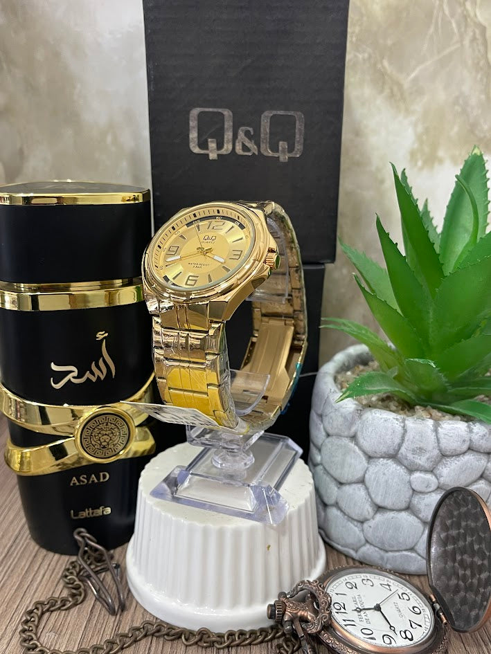 RELOJ Q&Q CABALLERO DORADO DETALLES NEGROS