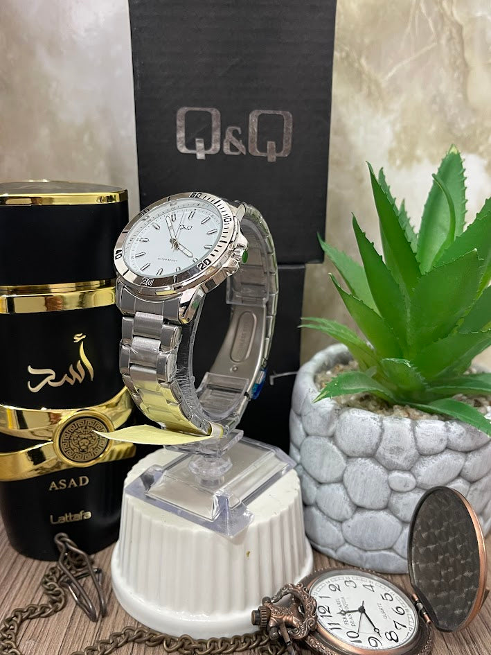RELOJ QYQ CABALLERO BICOLOR DETALLES NEGROS