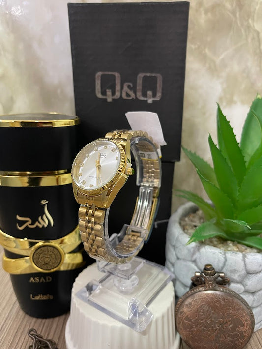 RELOJ Q&Q DAMA DORADO ESFERA BLANCA  NUMERO DIAMANTES QR