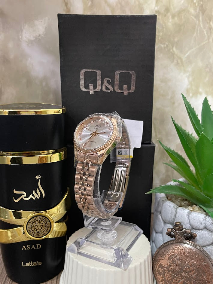 RELOJ Q&Q DAMA ORO ROSA ESFERA PLATEADA ARO ESTRIA Q