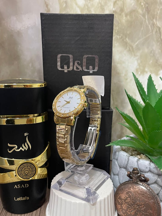 RELOJ Q&Q DAMA DORADO ESFERA BLANCA ARO DIAMANTADO RR