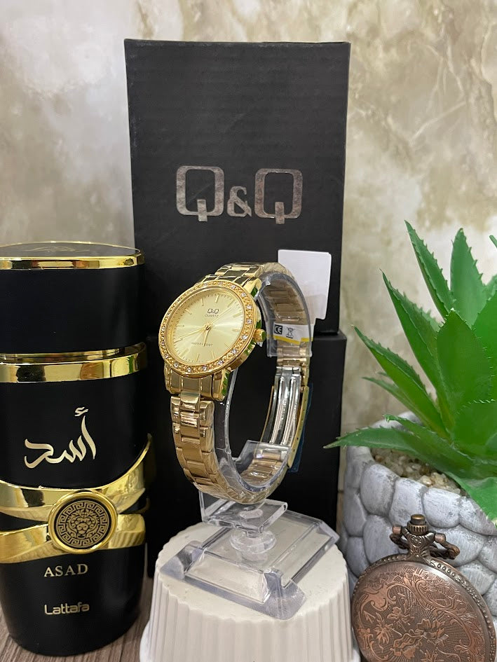 RELOJ Q&Q DAMA DORADO ESFERA DORADA ARO DIAMANTADO