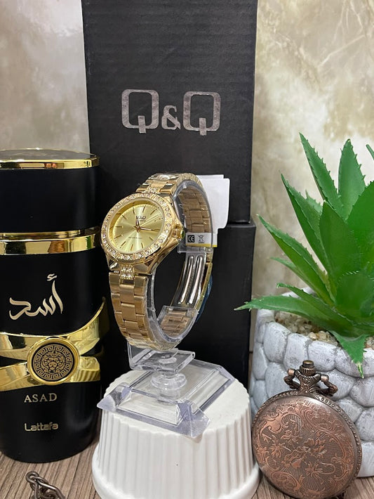 RELOJ Q& Q DAMA DORADO ESFERA DORADA ARO DOBLE DIAMANTE