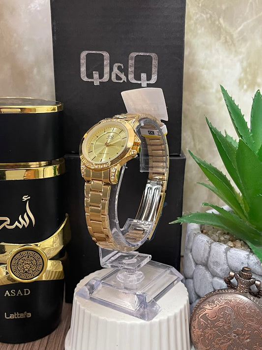 RELOJ Q&Q DAMA DORADO ESFERA DORADA DIAMANTE ARO Y CAJA