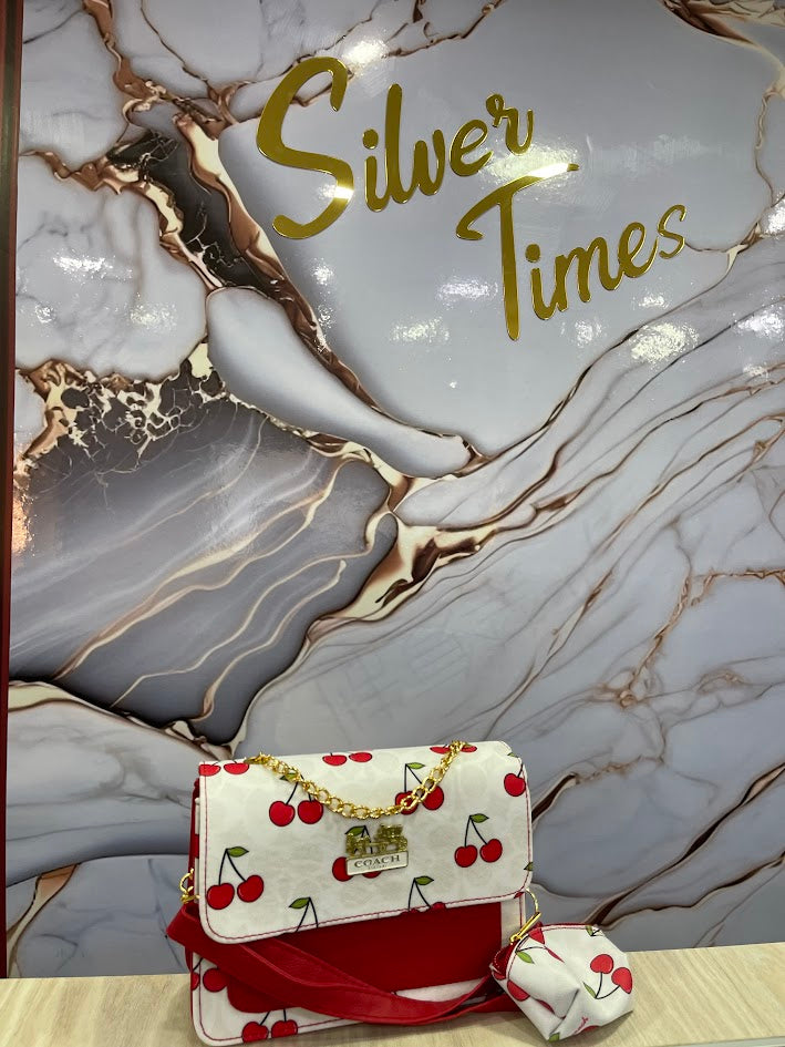 BOLO DAMA COACH ROJO BLANCO CERESAS