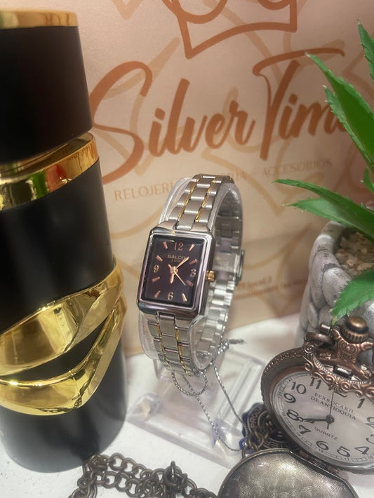 RELOJ SALCO DAMA FONDO NEGRO DETALLES BICOLOR