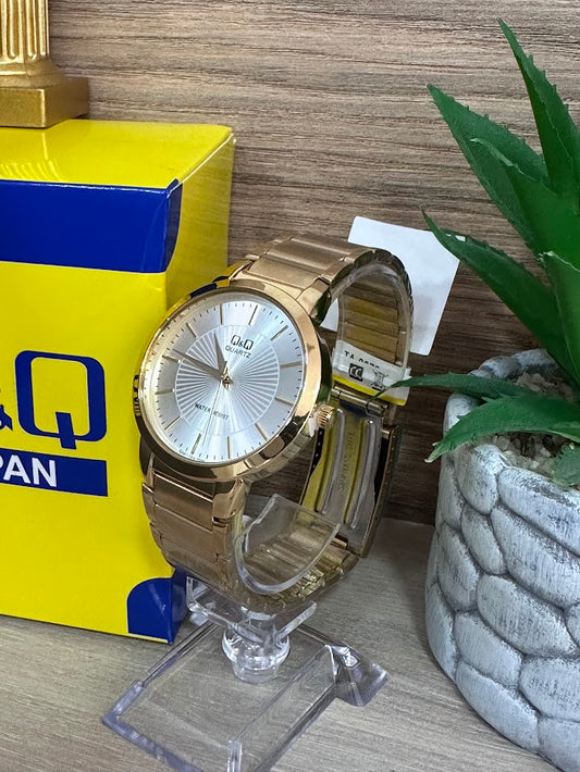 RELOJ QYQ DORADO FONDO PLATEADO