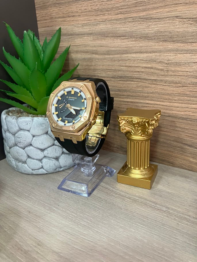 RELOJ CASIO SHOK DEPORTIVO NEGRO Y DORADO ARO BLANCO