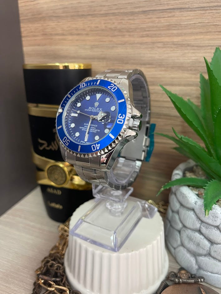 RELOJ ROLEX PLATEADO CON DETALLES AZUL REY