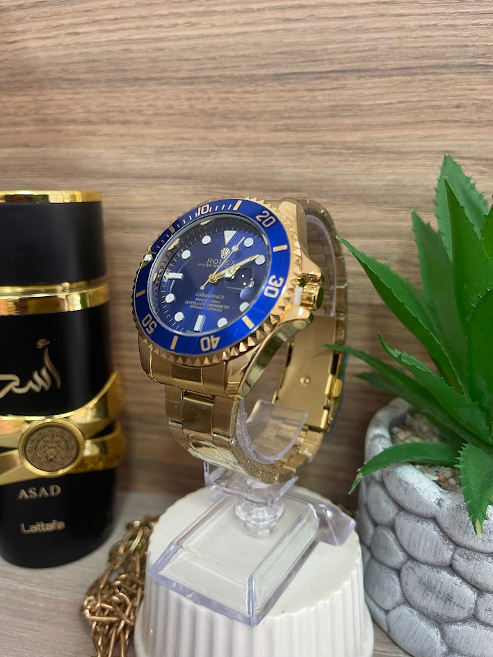 RELOJ ROLEX CABALLERO PLATEADO ESFERA Y ARO VERDE