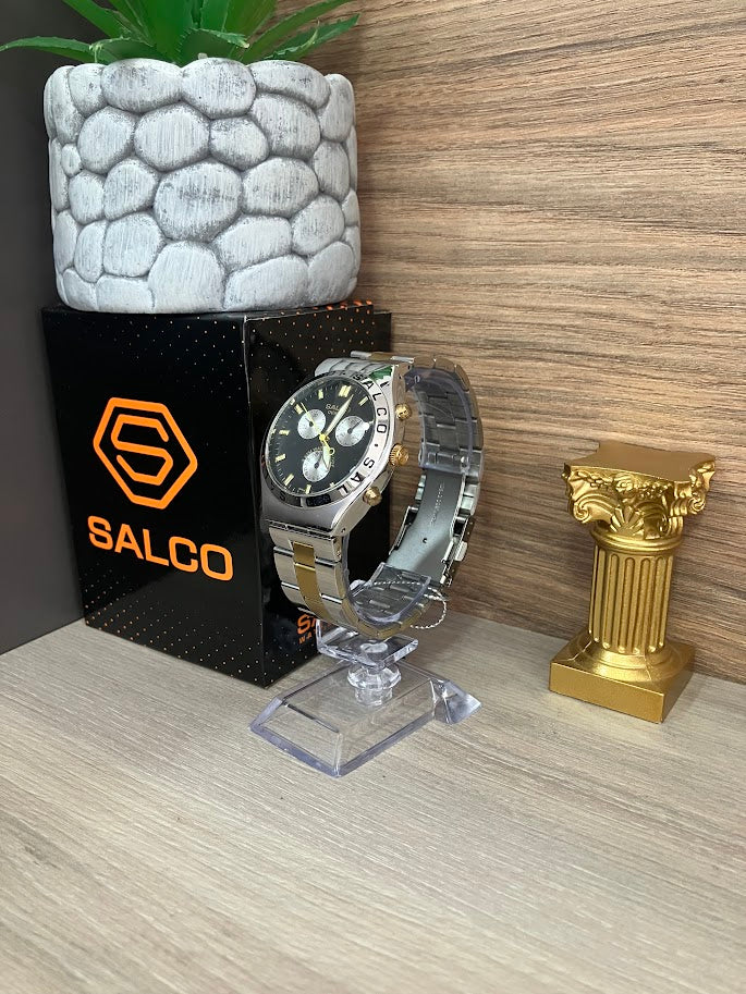 RELOJ SALCO PLATEADO ESFERA NEGRA ARO CONTRA MARCADO