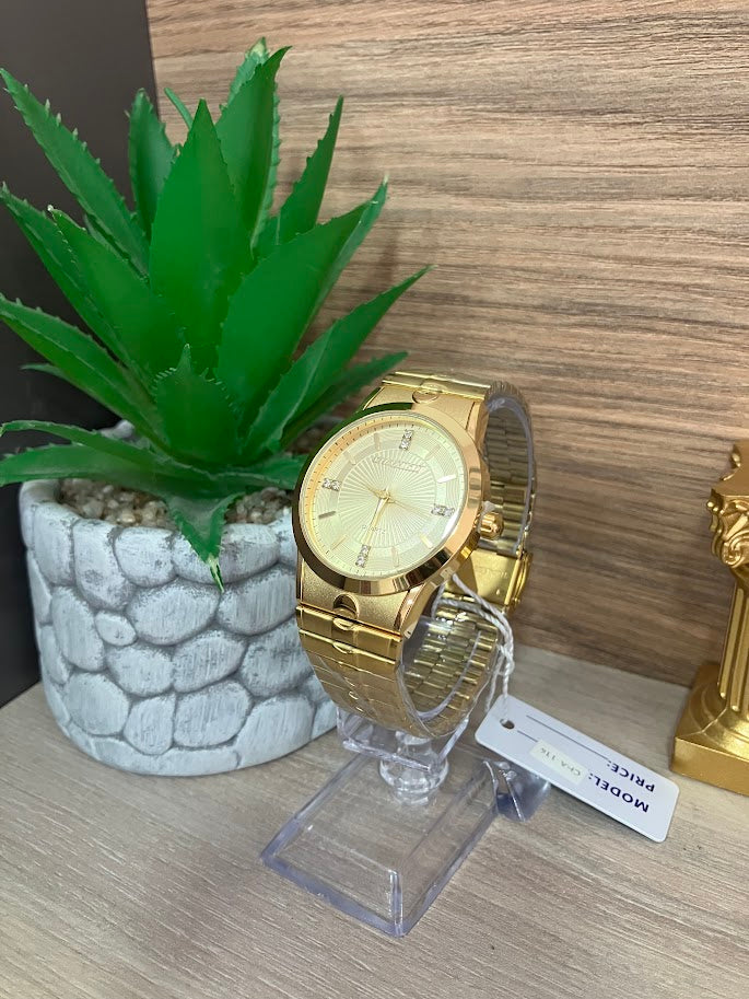 RELOJ CHAXIGO DORADO DETALLES EN PIEDRAS