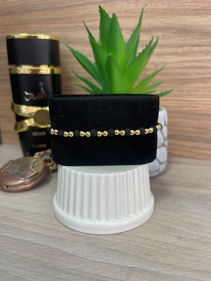 PULSERA NEGRA ORO LAMINADO NEOPRENO BALIN 4MM