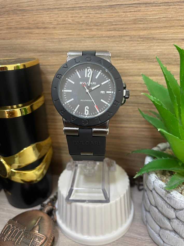 RELOJ BVLGARI NEGRO DETALLES BLANCOS