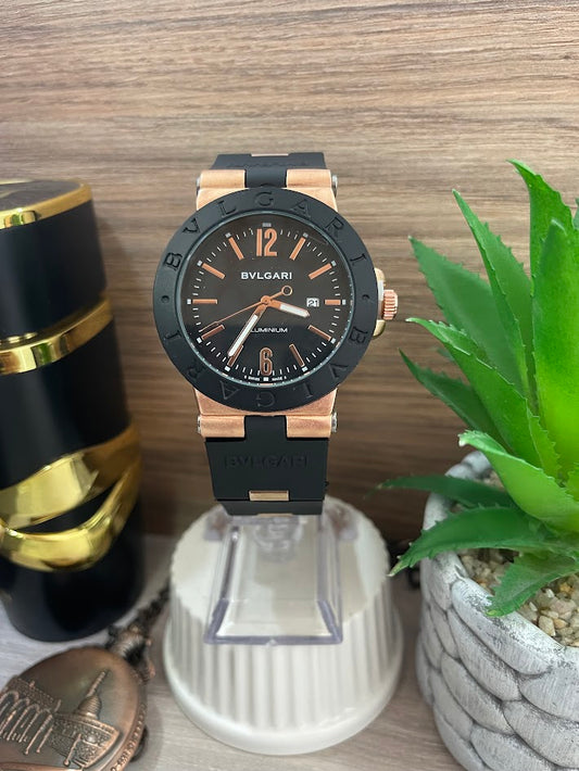 RELOJ BVLGARI NEGRO Y ORO ROSA