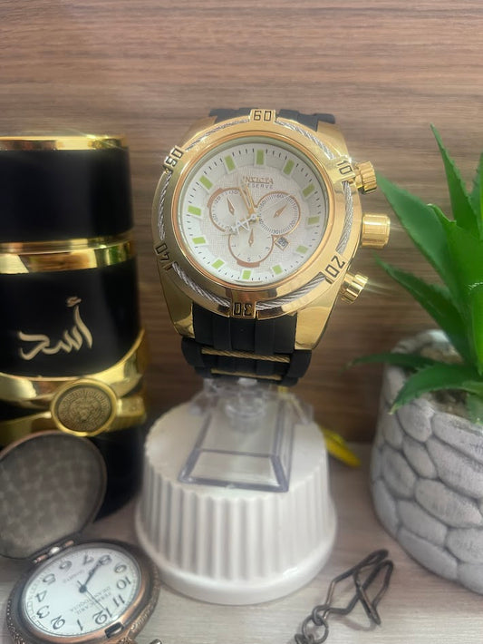 RELOJ INVICTA NEGRO Y DORADO DETALLES VERDES