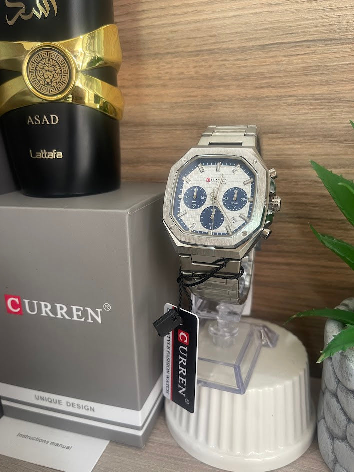 RELOJ CURREN CUADRADO PLATEADO ESFERA BLANCO Y AZUL CRONOGRAFOS