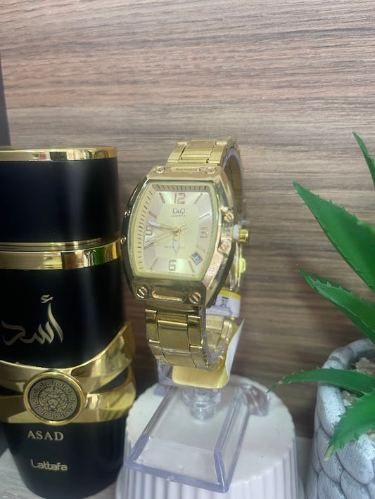 RELOJ QYQ DORADO DAMA
